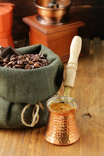 istock Still life coffee beans in a bag and  pot 516081937