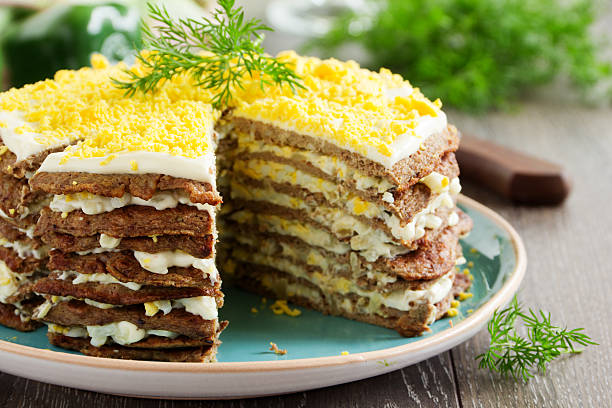 istock Cake pancakes from the liver with eggs and greens. 516082497