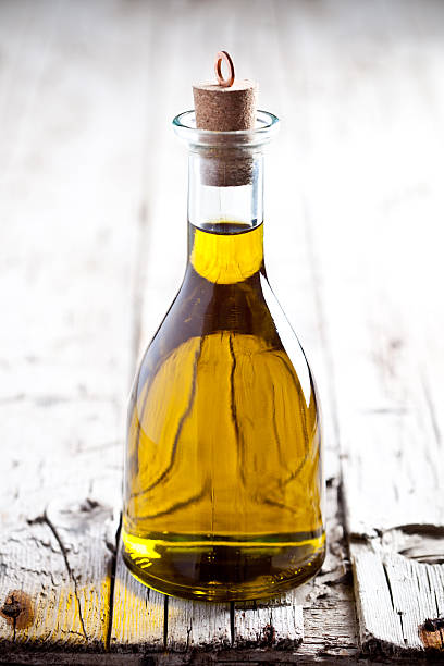 istock fresh olive oil in bottle 516082969