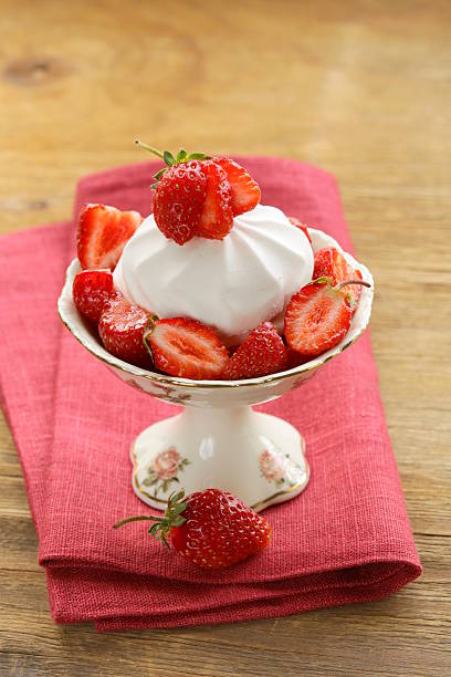 istock sweet white marshmallow meringue with fresh strawberries 516083159