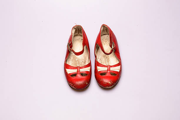 istock red and old kids shoes 516084053