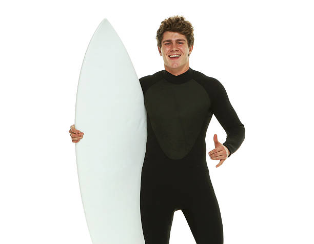 istock Smiling surfer showing shaka sign 516101832
