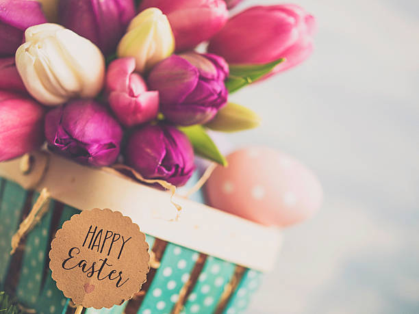 Easter arrangement with Easter basket and tulips