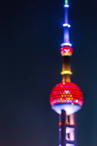 istock The Oriental Pearl tower distorted at night 516104118