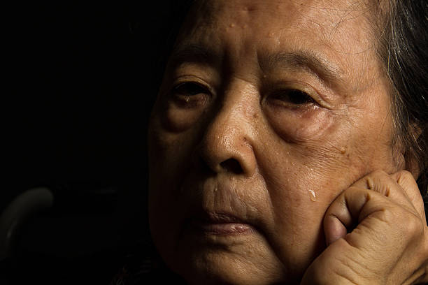 Loneliness elder woman crying