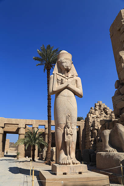 istock Ramses ii statue  in Karnak religious ,Egyp 516105598