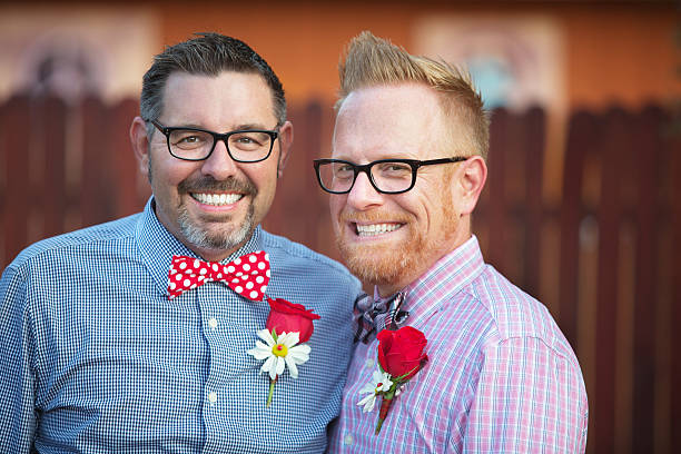 istock Handsome Smiling Gay Couple 516106000