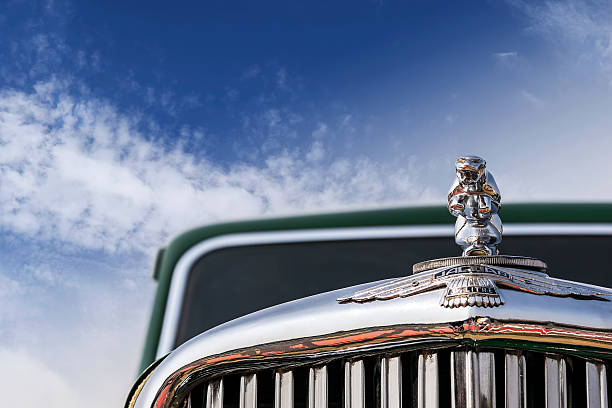 New Delhi, India - February 6, 2016: Front low angle view of an old-timer Jaguar Mark V 4-door Saloon, 1949 model in green color parked in New Delhi.