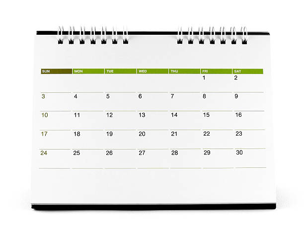 desk spiral calendar with days and dates in April 2016