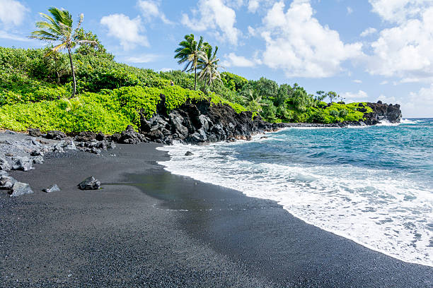 Black beach on Hawaii stock photo