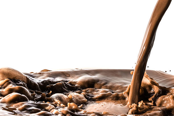 Chocolate liquid splash, pouring stream jet of chocolate, isolated