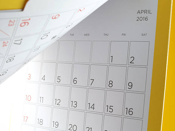 istock desk calendar with days and dates in April 2016 516109814