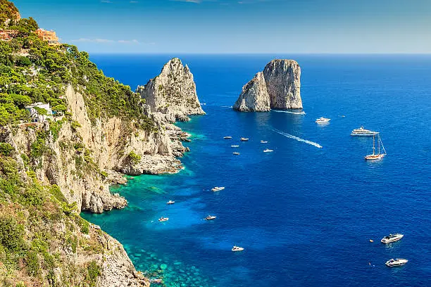 Faraglioni cliffs panorama,and the majestic Tyrrhenian sea,Capri island,Italy,Europe