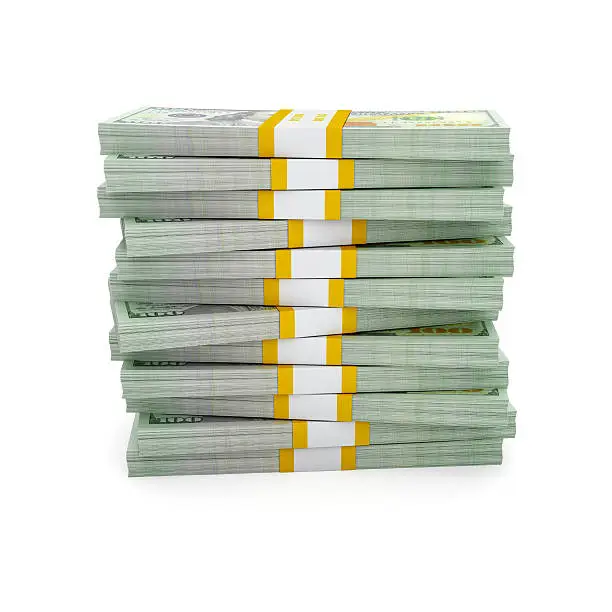 Creative business finance making money concept - stack of new 100 US dollars 2013 edition banknotes bills bundle isolated on white background