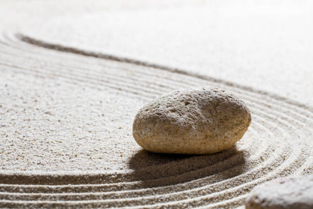istock single stone set on sinuous lines for concept of harmony 516111494
