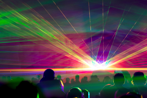 Very colorful show with a crowd silhouette and great laser rays on pyrotechnic festival in germany