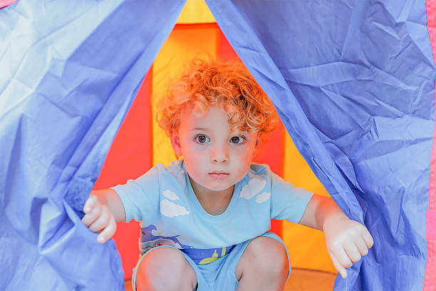 istock child in a tent 516114715