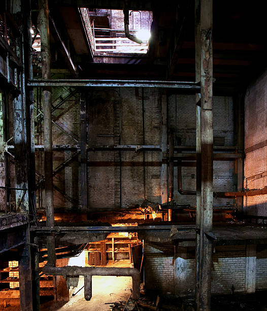 istock Old creepy, dark, decaying, destructive, dirty factory 516115335