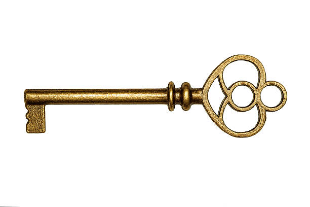 istock Golden key isolated on white 516115877