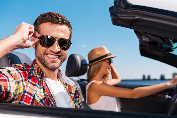 istock Couple in convertible. 516116137