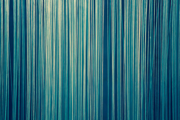 istock Blue abstract background made of vertical lines 516116379