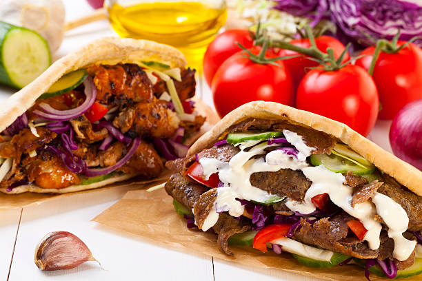 istock Kebab in a bun with garlic sauce 516118263