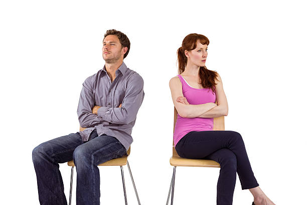 istock Sitting couple ignoring each other 516118337