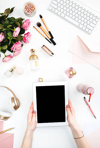 istock The female hands and tablet 516131548