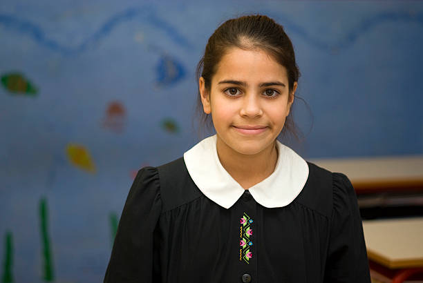 Portrait of a school girl in class setting