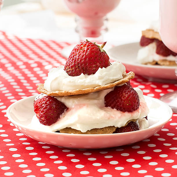 istock cake of waffles with strawberries and cream 516134954