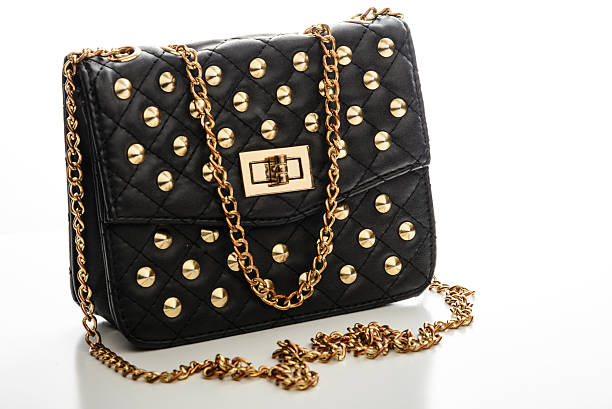 istock Black leather handbag with silver metal studs 516135922