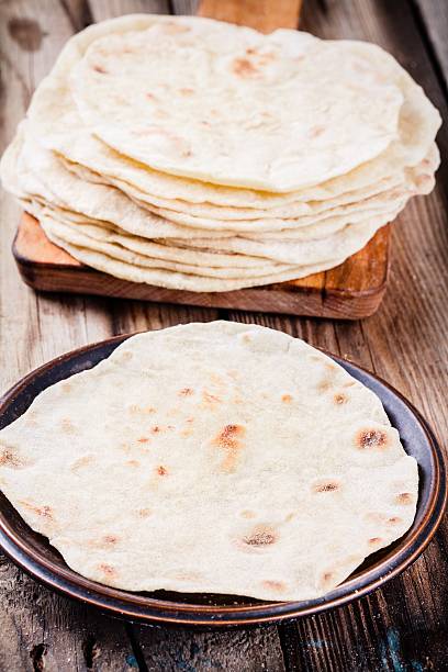 istock Stack of homemade wheat tortillas 516138434