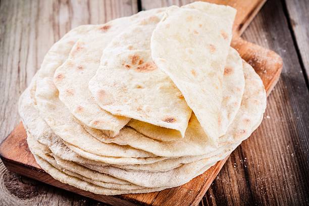 istock Stack of homemade wheat tortillas 516138588