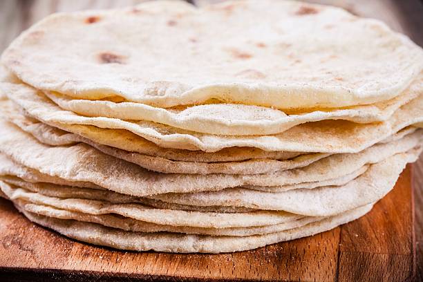 istock Stack of homemade wheat tortillas 516138798