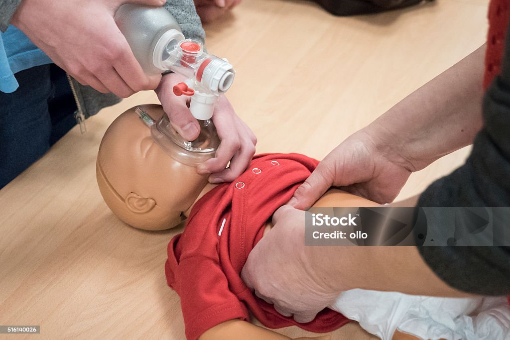 First aid - baby CPR training CPR Stock Photo