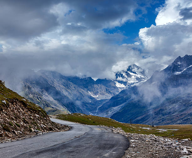 Road in Himalayas Road in Himalayas. Rohtang La pass, Himachal Pradesh, India himachal pradesh photos stock pictures, royalty-free photos & images