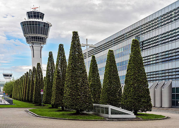 Munich airport Detail of the exterior of Munich airport, Germany, with control towers. munich airport stock pictures, royalty-free photos & images