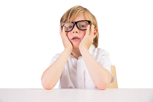 istock Worried student sitting with glasses 516141163