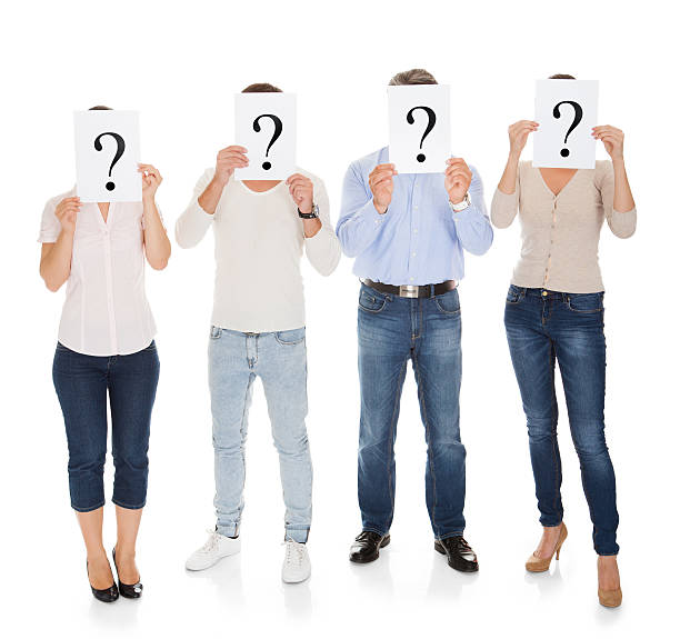istock Group Of A People Holding Question Mark Sign 516141635