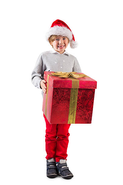 istock Child holding his christmas present 516142561