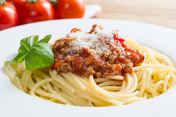 istock Spaghetti with Bolognese Sauce Parmesan and basil 516142631