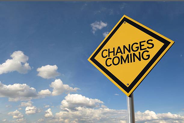 Changes coming yellow highway road sign stock photo