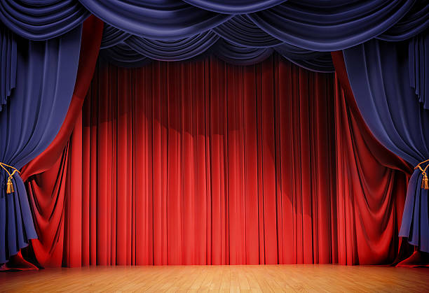 istock velvet curtains and wooden stage floor 516143634