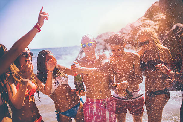 istock Friends Popping Champagne 516144271