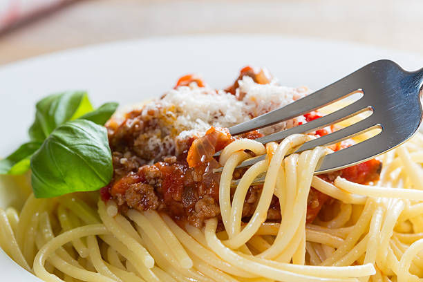 istock Spaghetti with Bolognese Sauce Parmesan and basil 516144635