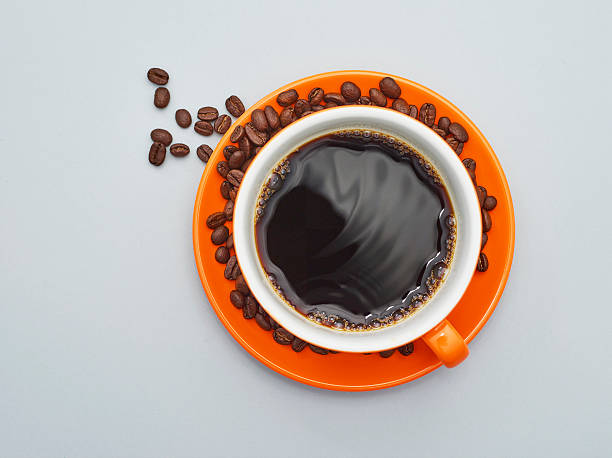 Lay flat coffee cup on gray. stock photo