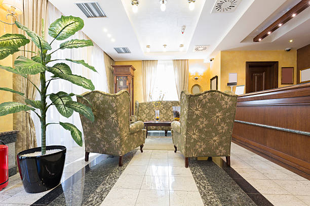 istock Reception area with wooden reception desk 516145628