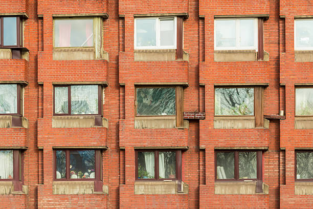 istock Windows in a row on facade of apartment building 516146580