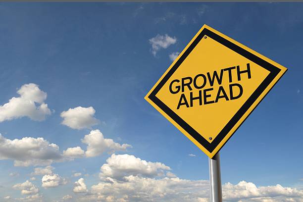 istock Growth ahead yellow highway road sign 516146662