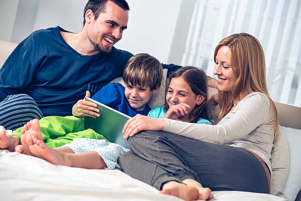 istock Watching some videos together in the morning 516147240